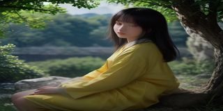 开元棋牌麻将大厅场景，竹制麻将牌在圆形棋桌上排列，四位玩家围坐对局，氛围温馨热闹